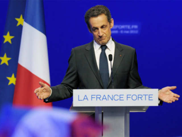 Nicolas Sarkozy reacts after his defeat