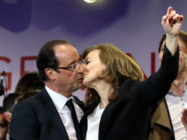 Francois Hollande celebrates with and companion Valerie Trierweiler