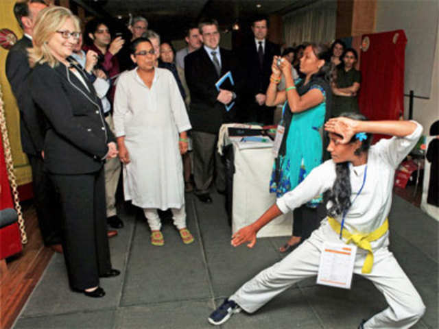 Clinton watches Karate performance