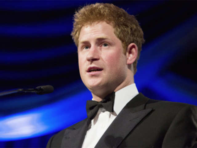 Britain's Prince Harry speaks after receiving the Humanitarian Award