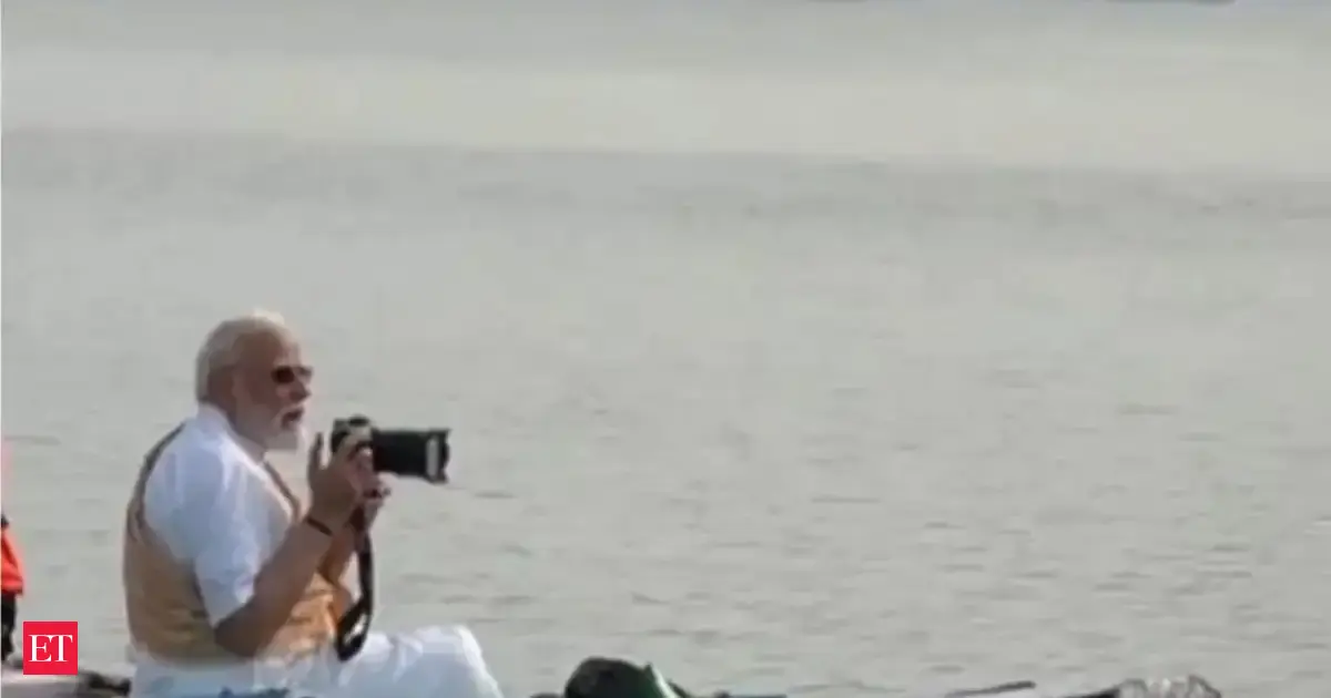 PM Modi takes boat ride on Hooghly river in Kolkata, tries his hand at photographing
