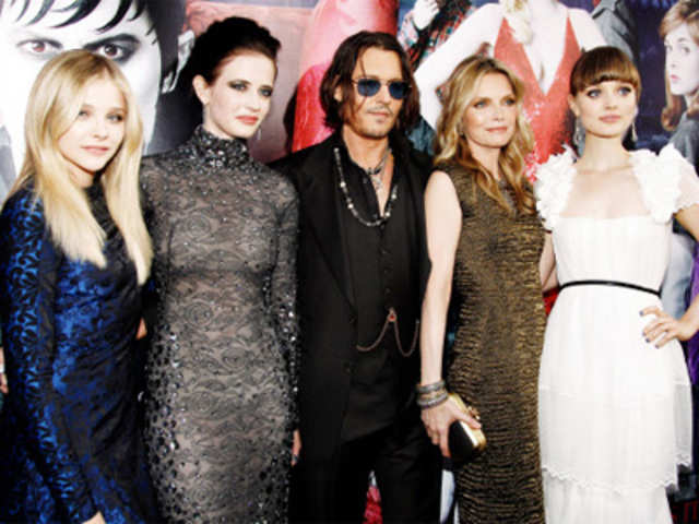Cast members pose at the premiere of 'Dark Shadows'