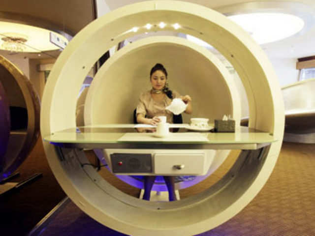 Egg-shaped dining booth at an A380 theme restaurant