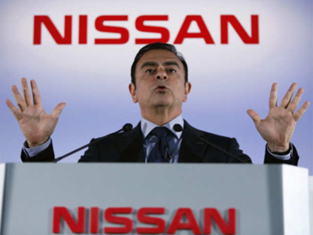 Nissan Chief Executive Ghosn speaks during a news conference in Yokohama