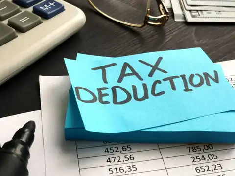 You give up business deductions but keep all your 80C and 80D benefits