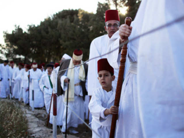Members of Samaritan sect walk during traditional pilgrimage