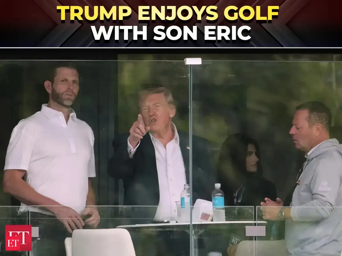 Trump and son Eric seen at LIV golf tournament at Trump National Golf Club amid West Asia tensions