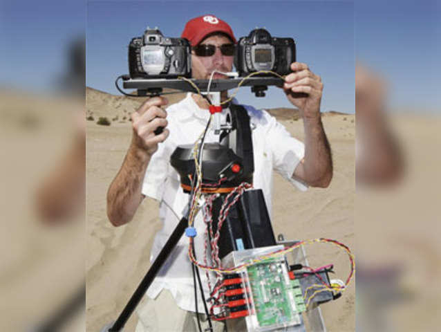 An engineer with Space Science Systems works with a photo system