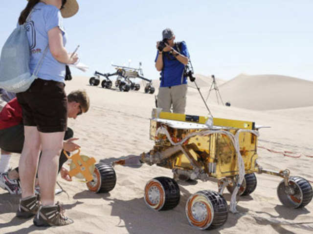 Test between an engineering model of current rover on Mars and its successor, 'Curiosity'