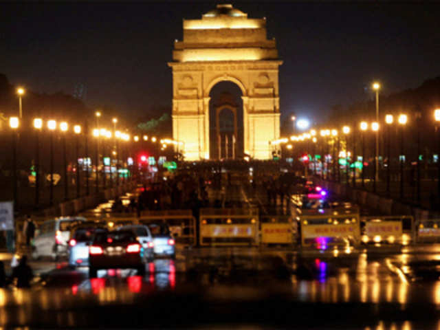 A view of illuminated Rajpath after heavy rains