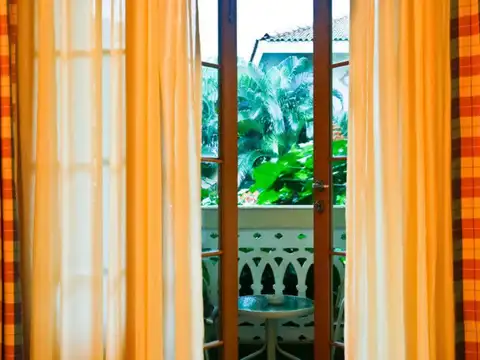 Hang a wet cotton curtain near the window