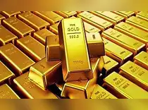 Gold slips as oil strength, interest rate worries dampen appeal