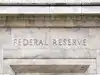 Fed officials mull raising rates to curb growing inflation risk