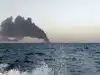 Iran says it fired warning missiles and drones at US warships in Gulf of Oman