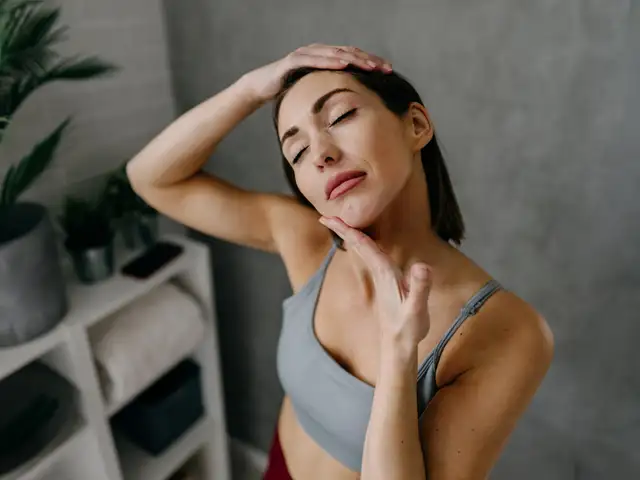 Neck stretch and chin lift