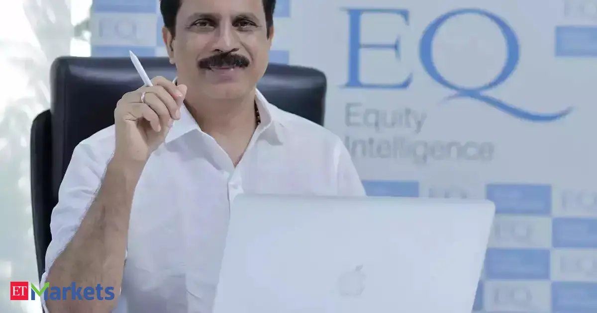 Indian stock market investor Porinju Veliyath confidently smiling, perhaps indicating market optimism.