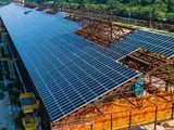 Scientists are borrowing a NASA dust-zapping trick to keep solar panels cleaner in dusty places like the American Southwest, India, and the Sahel, and the payoff could be cheaper power with less water and labor