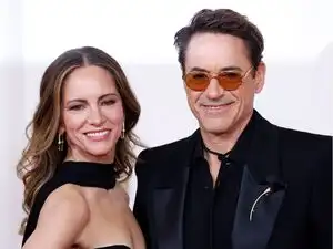 Quote of the day from Robert Downey Jr thanking his wife: 'She found me a snarling rescue pet, and loved me back to life. That is why I am here' ; lesson on importance of unconditional love from Sherlock Holmes star