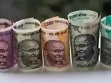 Rupee bounces from day's low on RBI support