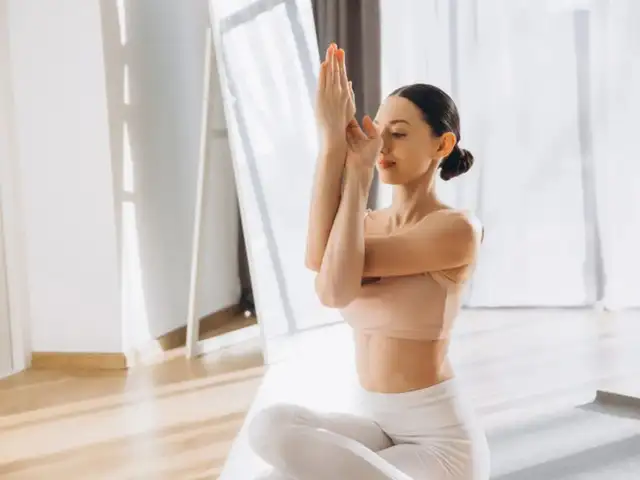 Garudasana Arms (Eagle Arms) - 7 yoga asanas to relieve back stiffness ...