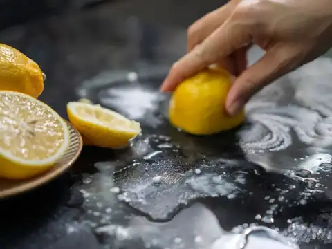 Cut A Lemon And Rub It Along The Sink Surface