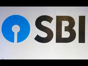 The new logo of State Bank of India (SBI) is pictured at the podium of the venue of a news conference after the announcement of SBI's fourth quarter results, in Kolkata
