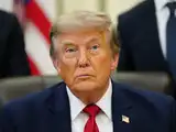 Trump's teleprompter operator under probe for insider trading