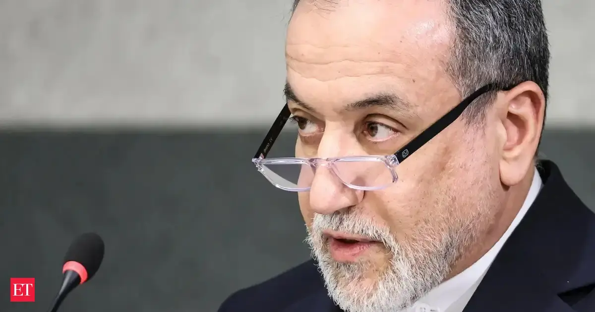 Iran says it is suspending commitments to interim deal with US as they exchange attacks