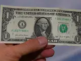 Dollar wavers as markets grapple with Gulf tensions