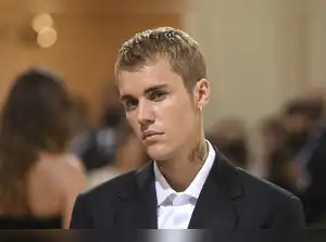 Quote of the day by Justin Bieber highlights the importance of staying strong, accepting criticism and believing in yourself despite different opinions. The quote says: "No matter how talented you are, not everyone is going to like you, but that’s life. Stay strong."