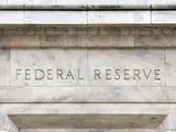 Fed keeps interest rates unchanged, citing ongoing inflation concerns