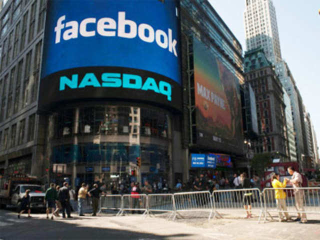 Facebook IPO begins trade at $42.05/share