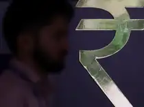 Rupee gains 30 paise to touch monthly high