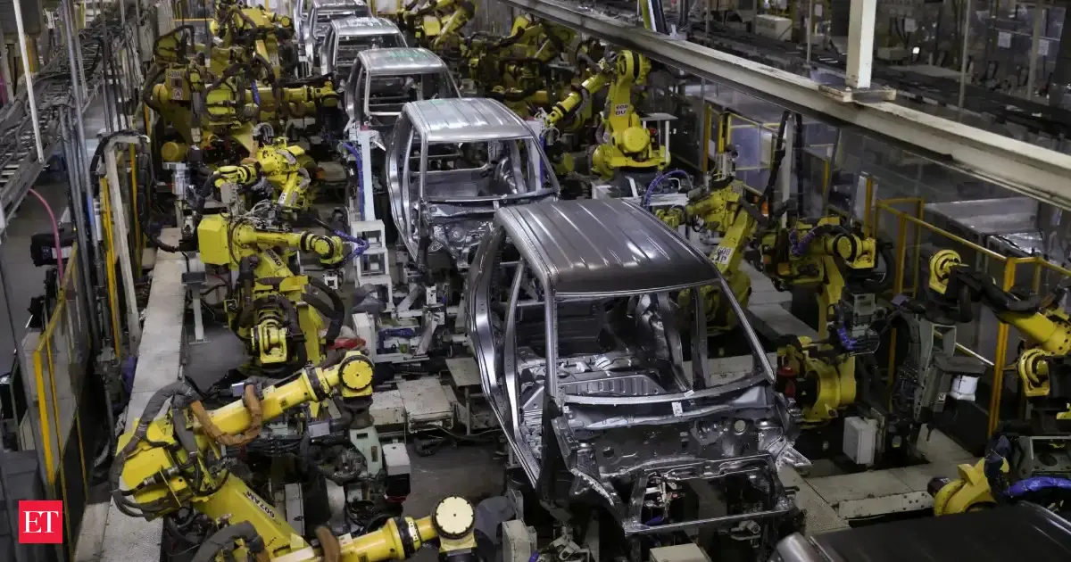 Carmakers partly absorb commodity shocks to keep production on track