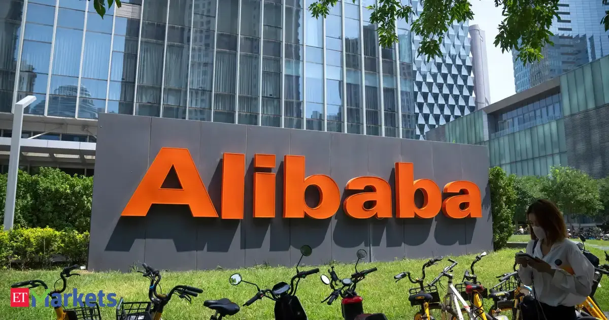 Chinese stock market chart showing a downturn, contrasted with Alibaba's logo, symbolizing AI innovation and market resilience.