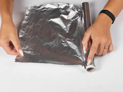 Slice through the folded foil