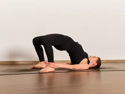 Bridge Pose (Setu Bandha Sarvangasana): Support the spine and hips