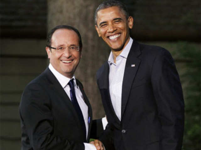 Barack Obama with Francois Hollande on arrival for G8 Summit