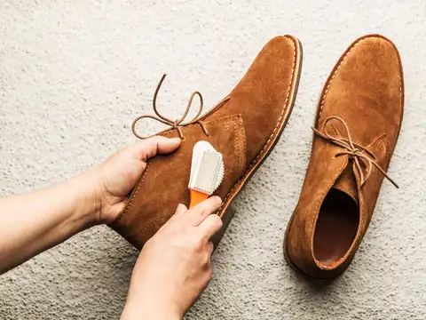 Clean suede shoes with a soft brush