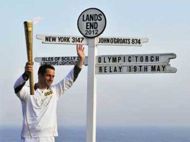 British Olympic sailor Ainslee carries the Olympic torch
