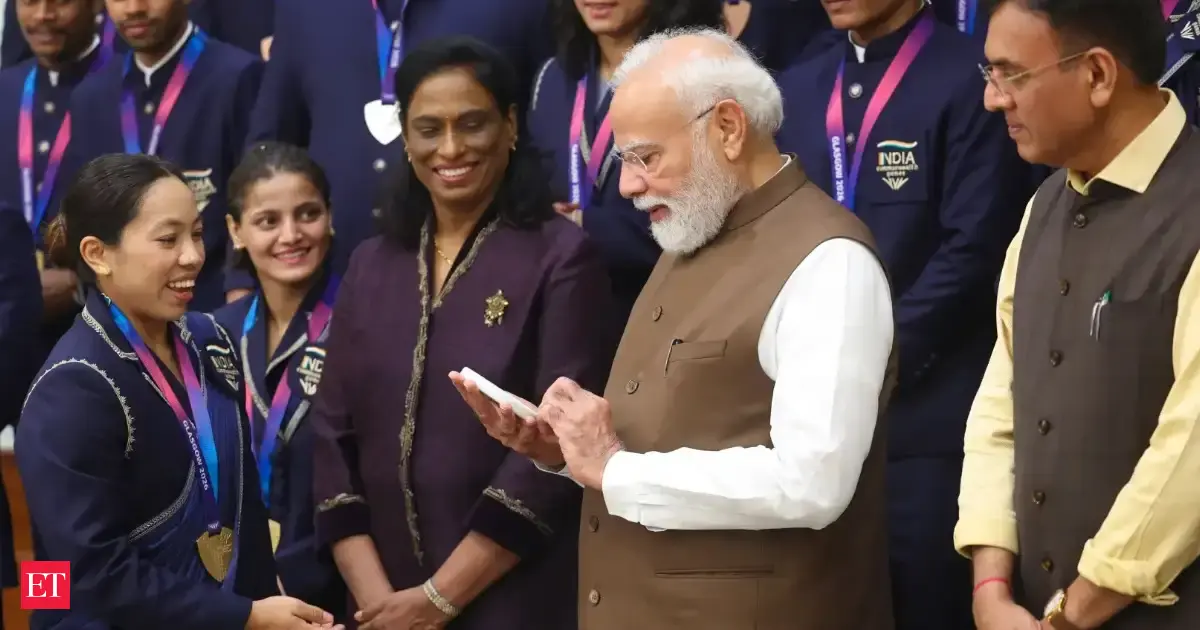 PM Modi meets CWG medallists: Lauds Lovlina for objecting to distorted India map; feeds laddus to Mirabai