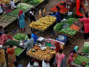 India's wholesale inflation rose to 9.87 percent in June