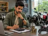How to plan your bike purchase with a two-wheeler loan without stretching your monthly budget