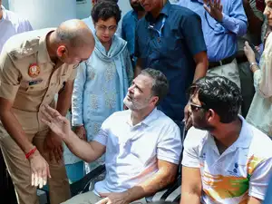 New Delhi, Aug 21: Lok Sabha LoP Rahul Gandhi interacts with IPS officer S...