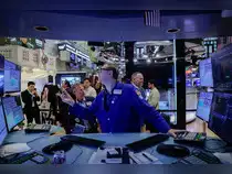 A trader works on the floor of the New York Stock Exchange (NYSE) in New York City