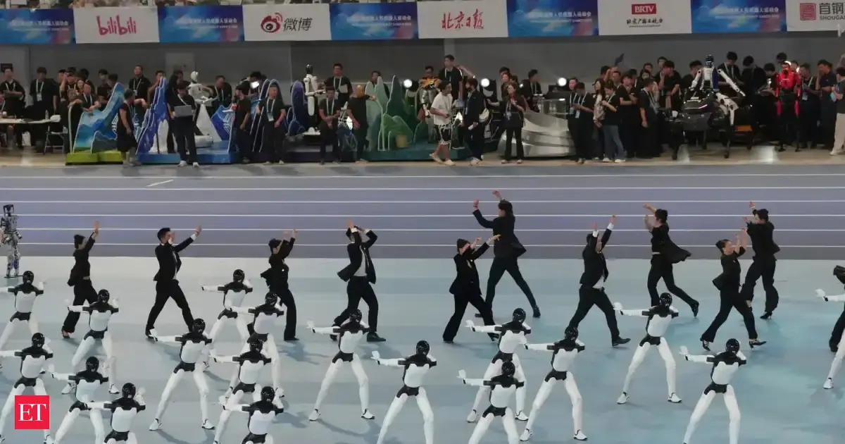 A sleek humanoid robot sprinting effortlessly past a digital finish line, with a timer indicating a new world record