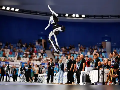 Robot takes part in a long jump contest