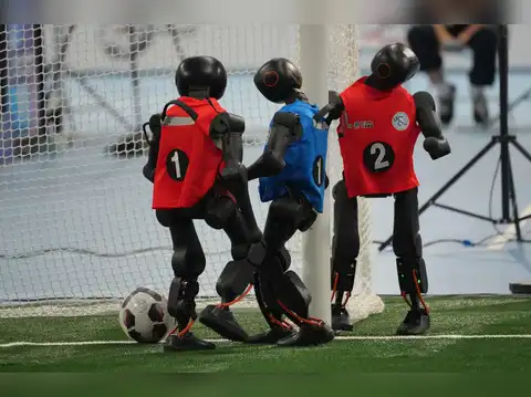 Robots play soccer