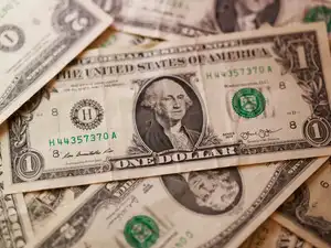 Illustration shows U.S. dollar banknotes