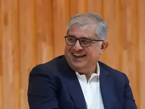 FILE PHOTO: Axis bank CEO, Amitabh Chaudhry reacts during a Meta conference in Mumbai
